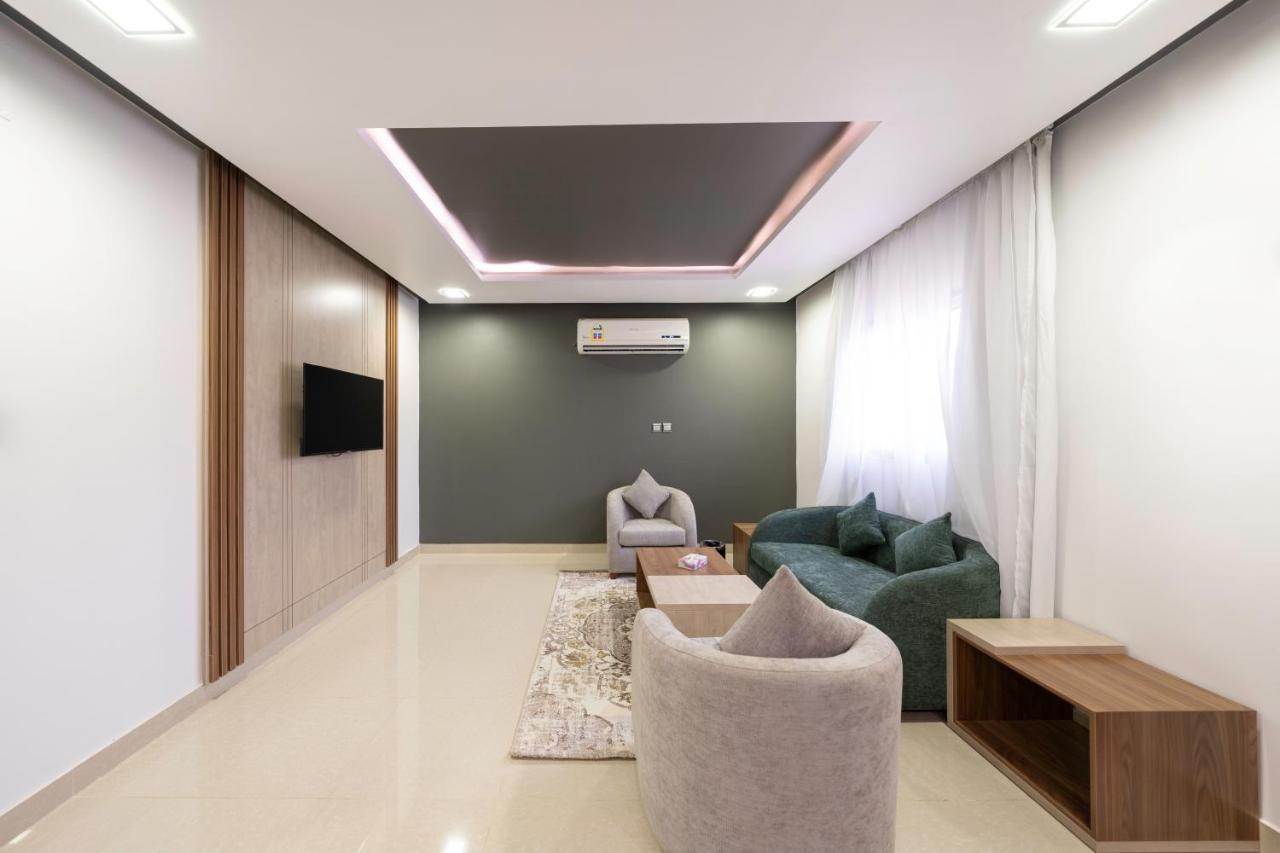 Mirada Gold Jizan - Resort & Private Pools 外观 照片 A living room with a suspended ceiling